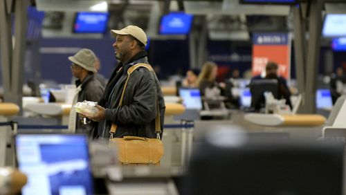 Delta Air Lines ticket counter (AP Photo/David Tulis)