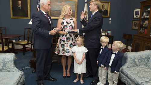 Vice President Mike Pence swears in Nick Ayers as his top aide as Ayers' wife and triplets look on. Photo provided by the White House.