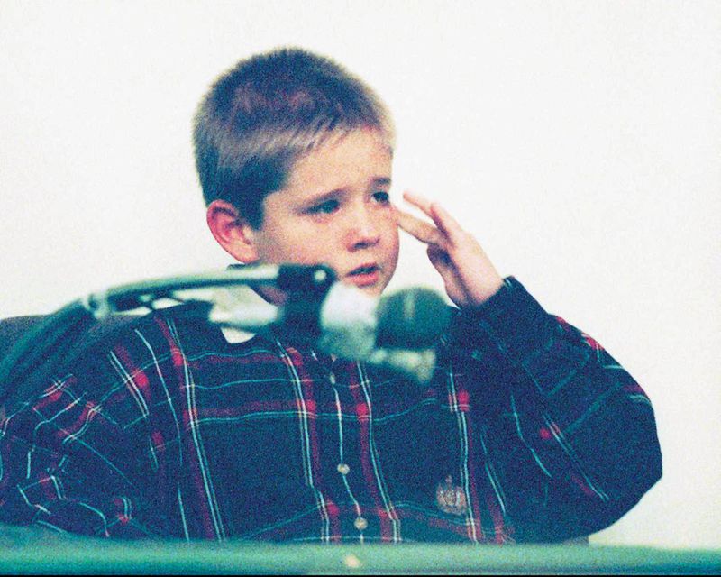 Ricky Tokars when he was 8 years old, testifying at the February 1995 trial of Curtis Alphonso Rower in Appling, Georgia. Rower was on trial for the 1992 murder of Ricky’s mother, Sara Tokars. CREDIT: Blake Madden / Augusta Chronicle via AP