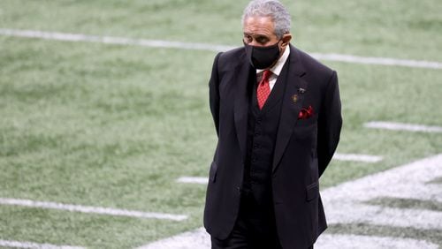 Falcons owner Arthur Blank walks on the sideline in the remaining minutes of the Falcons' 23-16 loss against the Carolina Panthers Saturday, Oct. 11, 2020, at Mercedes-Benz Stadium in Atlanta. (Jason Getz/For the AJC)
