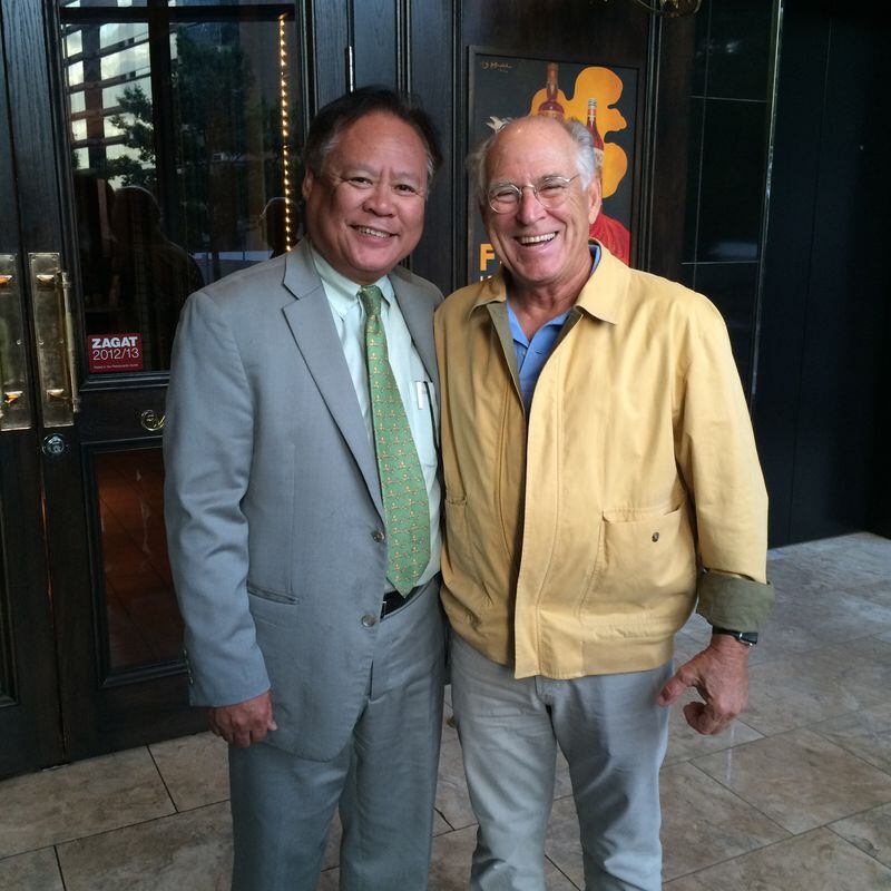 Jimmy Buffett with Bistro Niko general manager Sam Than.