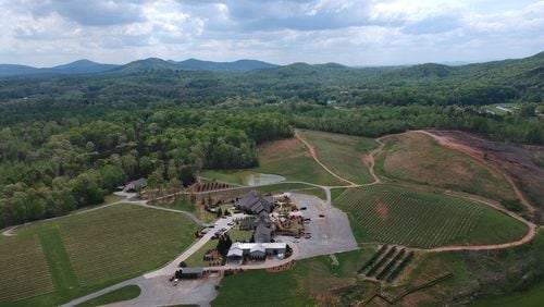 April 18, 2019 Cleveland - Aerial photo of Yonah Mountain Vineyards where solar panels (foreground right) were installed in Cleveland on Wednesday, April 18, 2019. Yonah Mountain Vineyards is the first winery in Georgia to implement a major solar power initiative with the goal of countering its carbon footprint. It is currently the only winery in the Southeast with a program of this size generating at least 60% of its total annual energy usage. HYOSUB SHIN / HSHIN@AJC.COM