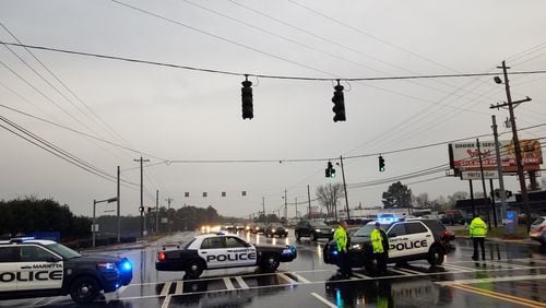 Marietta police shut down Cobb Parkway in both directions for a time Tuesday morning to investigate a pedestrian accident.