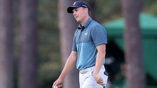 Jordan Spieth reacts to missing a birdie putt on the 15th hole during the Masters Tournament Sunday, April 11, 2021, at Augusta National Golf Club in Augusta. (Curtis Compton/ccompton@ajc.com)