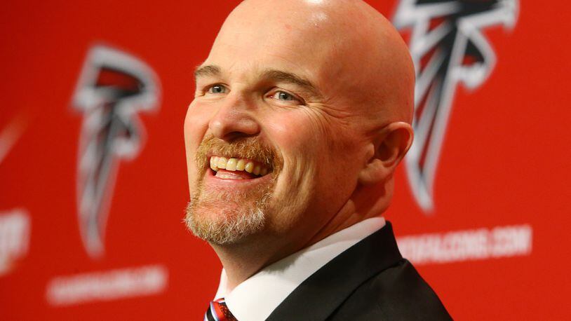 Dan Quinn is all smiles as he is introduced as Falcons coach during a news conference on Tuesday, Feb 3, 2015, in Flowery Branch, Ga. Quinn, 44, spent the past two seasons as the Seattle Seahawks defensive coordinator after holding the same position at the University of Florida. (Curtis Compton/Atlanta Journal-Constitution/TNS) New Falcons coach Dan Quinn says he wants wide receiver Julio Jones on his team. (Curtis Compton, AJC)
