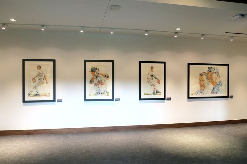 Richard Sullivan’s paintings are located in the hallways outside the Champions Suites at SunTrust Park, and depict the Braves organization’s three World Series titles in 1914, 1957 and 1995. CONTRIBUTED