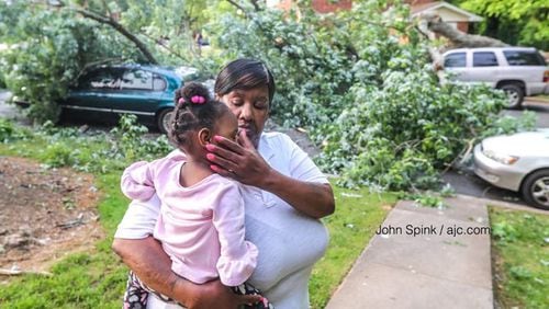 Sheila Winder and her granddaugther were in a car when a tree smashed the vehicle Friday morning.