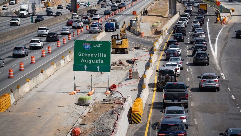 Traffic heads east on I-285 near the new Ga-400 exit ramp Saturday afternoon after one lane of I-285 was blocked off for construction. Ben Gray for the Atlanta Journal-Constitution