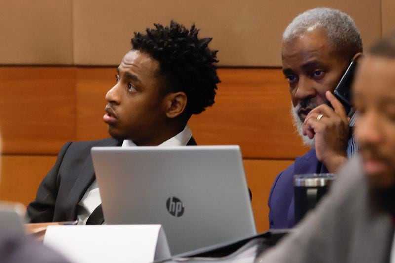Marquavius Huey, left, appears and his attorney Careton Matthews at the Fulton County Courthouse on Jan. 4, 2023. (Natrice Miller/natrice.miller@ajc.com)  