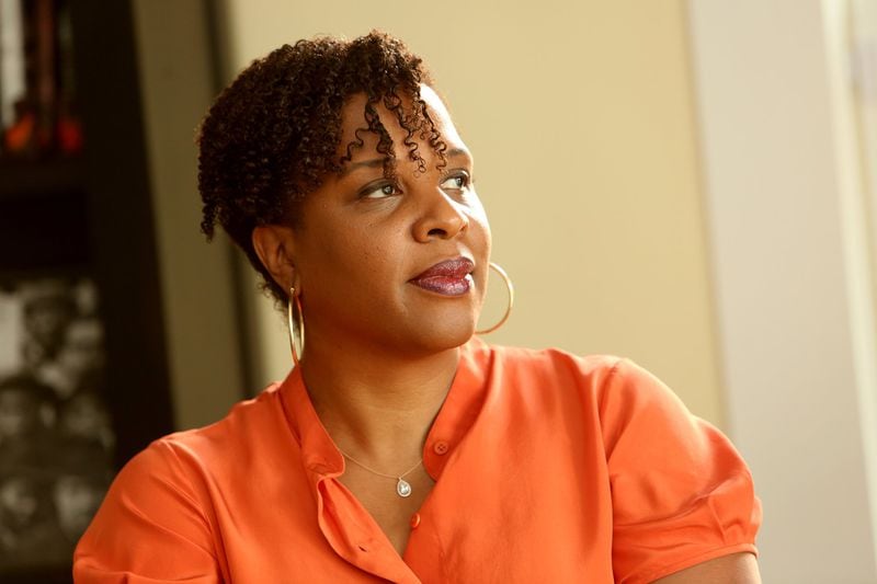 Emory Professor and acclaimed author, Tayari Jones, poses in her Atlanta home. (Tyson Horne / tyson.horne@ajc.com)