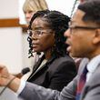 Whistleblower Amanda Timpson listens as her attorney Mario Williams speaks during a hearing about District Attorney Fani Willis at the Georgia State Capitol on Thursday, May 23, 2024. Timpson worked in the DA’s office as director of gang prevention and intervention from December 2018 to January 2022. (Natrice Miller/ AJC)