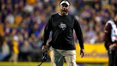 Texas A&M head coach Kevin Sumlin reacts on the sideline in the first half of an NCAA college football game against LSU in Baton Rouge, La., Saturday, Nov. 25, 2017. (AP Photo/Gerald Herbert)