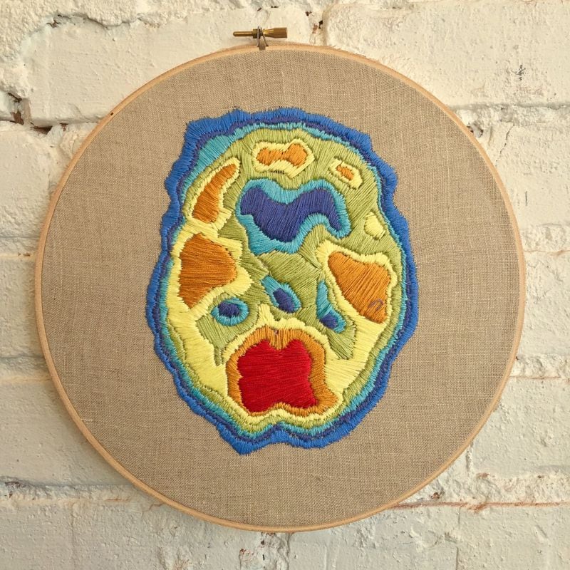 “Mental Terrain (Schizophrenia)” in thread, fabric and embroidery hoop is featured in the solo show “Common Threads: Selected Work From David Gabbard” at Paper Plane Gallery.