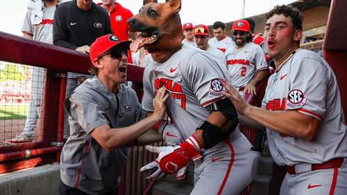 That's Georgia outfielder Logan Jordan (17) under that dog mask. It was bestowed upon the 6-foot-3 graduate after his pinch-hit, grand slam home run in the eighth inning on Saturday, which ultimately proved to be a game-winner in Georgia’s 14-6 victory over South Carolina at Founders Park in Columbia, South Carolina, on May 11, 2024. (Kari Hodges/UGA Athletics)