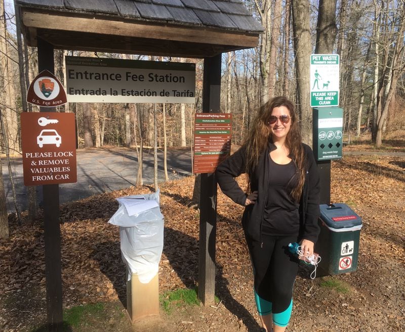 Alexandra Kemp at one of the Chattahoochee River National Recreation Area’s sites, where the boxes people normally use to deposit fees have been sealed and the headquarters building has been closed. Photo: Jennifer Brett