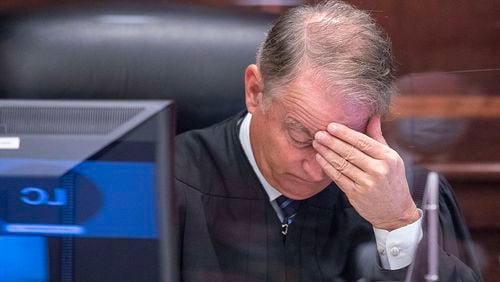Superior Court Judge Brian Amero rubs his head while listening to arguments during a hearing on a motion to dismiss s case seeking review of Fulton County elections ballots to determine fraud. (Alyssa Pointer/Atlanta Journal Constitution)