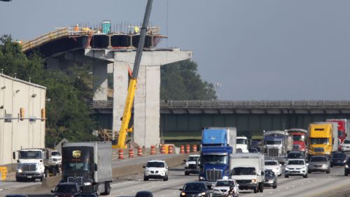 View of the express lane bridge over the Canton Road Connector. I-75 southbound is in the foreground. The Northwest Corridor express lanes project is under active construction, and is expected to open in 2018. BOB ANDRES / BANDRES@AJC.COM