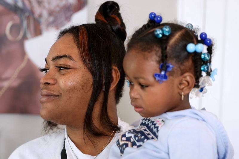 Wyquita Jones and her daughter Royal have been living at the maternity home since a few days before the grand opening. (Natrice Miller/ natrice.miller@ajc.com)