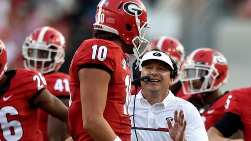 Georgia Bulldogs head coach Kirby Smart and quarterback Jacob Eason (10) are entering their second season in Athens.