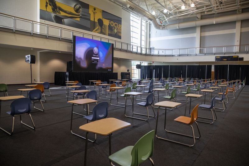 A large classroom is set up in a recreation gym at the Dr. Betty L. Siegel Student Recreation and Activities Center during the first day of classes at Kennesaw State University's main campus in Kennesaw, Monday, Aug. 17, 2020. (Alyssa Pointer / Alyssa.Pointer@ajc.com)