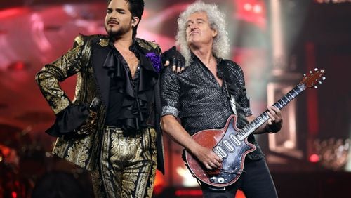 Queen + Adam Lambert (left, with Brian May) packed State Farm Arena during their "Rhapsody" tour appearance on Aug. 22, 2019.