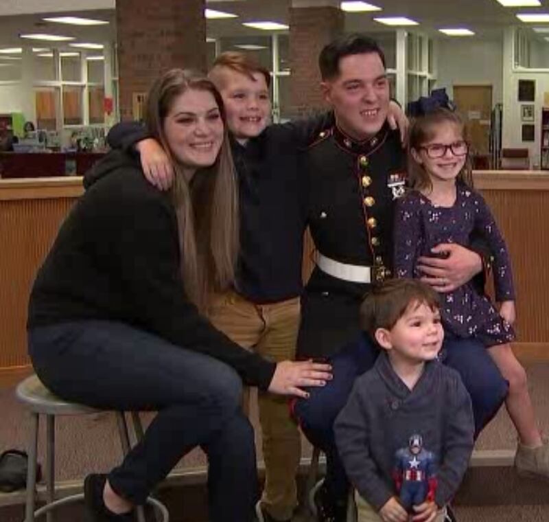 Sgt. Garen Evans, a Marine, came home early from his deployment to be able to give his children a brief surprise on Friday. (Photo: Channel 2 Action News)