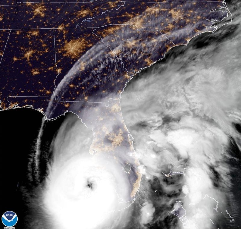 This satellite image provided by NOAA shows Hurricane Ian off Florida's southwest coast Wednesday, Sept. 28, 2022. The U.S. National Hurricane Center says Ian has rapidly intensified off Florida's coast, gaining top winds of 155 mph, just shy of the most devastating Category 5 hurricane status.