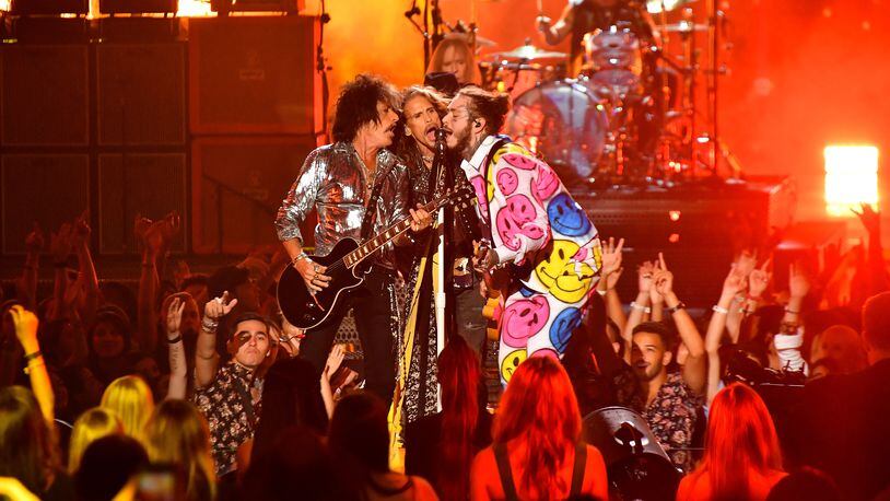 Post Malone (right) has a blast onstage with Aerosmith at the VMAs. He’ll join the guys again for a pre-Super Bowl concert.