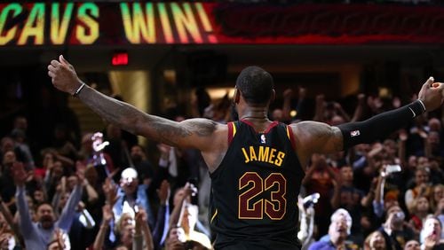 Look at me, world: LeBron James exults after a game-winning shot against Toronto during the Eastern Conference semifinals. (Gregory Shamus/Getty Images)