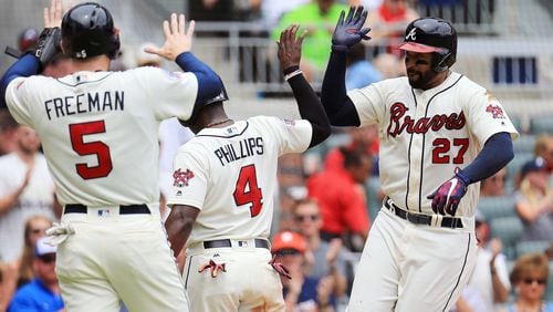 Freddie Freeman, Brandon Phillips and Matt Kemp have formed the core of a productive Braves' offense this season. (Daniel Shirey/Getty Images)
