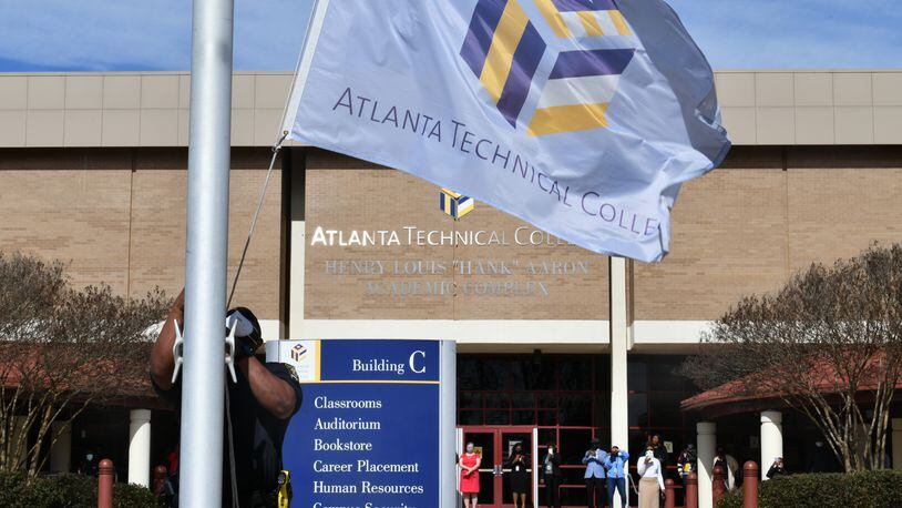 Atlanta Technical College lowered flags to half-staff to honor Hank Aaron earlier this year. Georgia manages leases on classroom buildings for technical colleges. (Hyosub Shin / Hyosub.Shin@ajc.com)