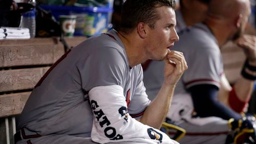 Braves starting pitcher Lucas Sims sits in the dugout during a game against the Miami Marlins. (AP Photo/Lynne Sladky)