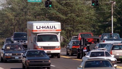 Metro Atlanta ranked third in the nation for population growth last year, according to the Census Bureau. Year after year, more people have moved to Georgia than left. (AJC Staff Photo/Phil Skinner)