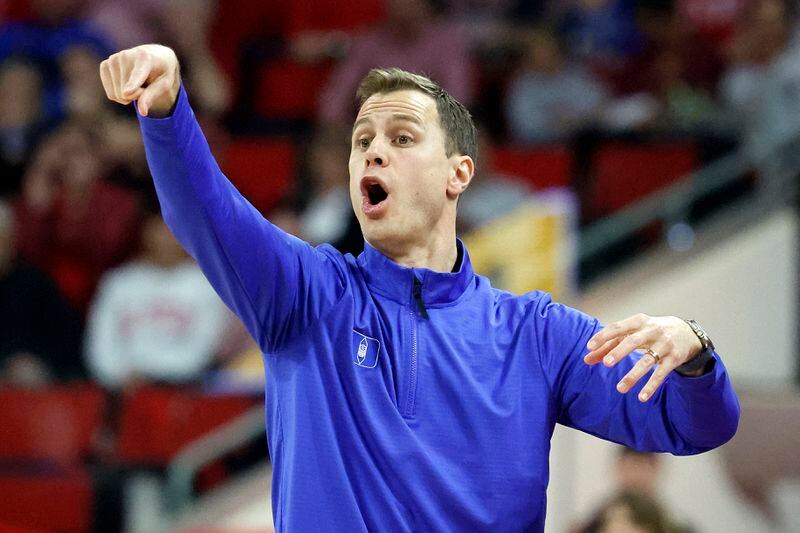 FILE - Duke head coach Jon Scheyer shouts from the sideline against North Carolina State during the first half of an NCAA college basketball game in Raleigh, N.C., Monday, March 4, 2024. Scheyer’s Blue Devils have seen seven players enter the transfer portal, but they’ve added two veterans to go with the nation’s top-ranked recruiting class. (AP Photo/Karl B DeBlaker, File)
