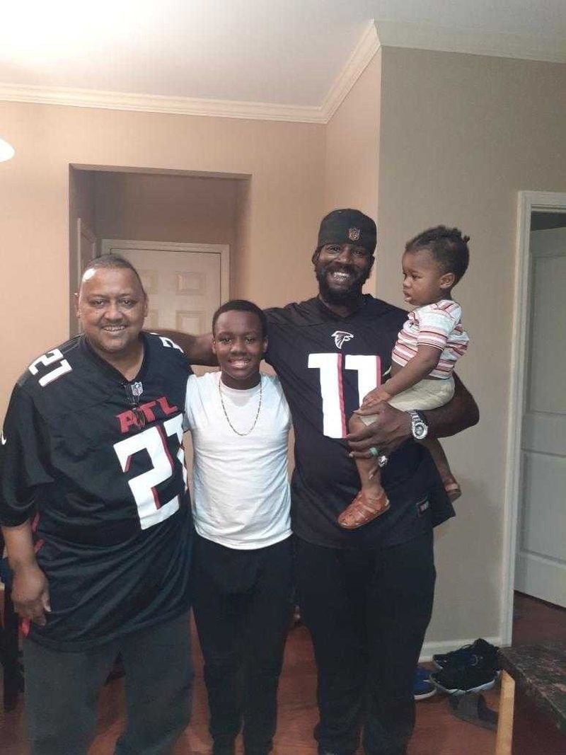 Ronald Barner (left) loved his family and the Atlanta Falcons. He was shot to death earlier this month while walking in his southwest Atlanta neighborhood.