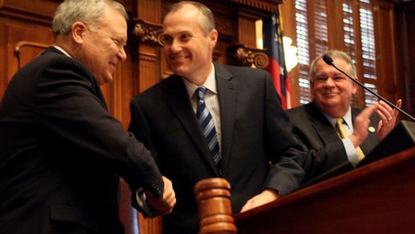 Gov. Nathan Deal is welcomed to the podium by Lt. Gov. Casey Cagle &amp; House Speaker David Ralston. Phil Skinner pskinner@ajc.com Gov. Nathan Deal, Lt. Gov. Casey Cagle and House Speaker David Ralston.
