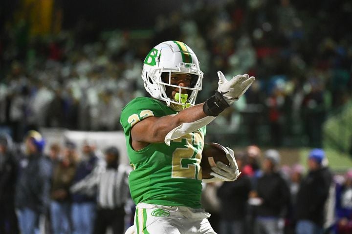 Justice Haynes of Buford celebrates after scoring a touchdown during the Walton vs. Buford game on Friday, Nov. 18, 2022, at Buford High School. (Jamie Spaar for the Atlanta Journal Constitution)