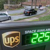 Cars arrive at 55 Glenlake Parkway NE, in Sandy Springs where office workers at UPS streamed back into work on Monday, March, 4, 2024 the first day a new policy requiring them to come into work in person five days a week took effect. The new policy was announced in January, (John Spink / John.Spink@ajc.com)