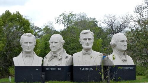 “Mount Rush Hour,” David Adickes’ sculpture amid the tangle of freeways in downtown Houston, includes Sam Houston, Steven F. Austin, Abraham Lincoln and George Washington. Helen Anders/For the American-Statesman