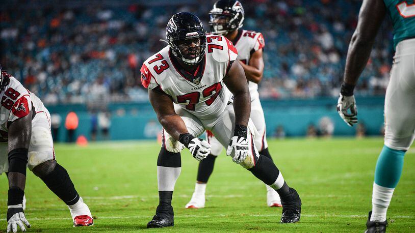 Falcons offensive lineman Matt Gono (73) lines up in the first quarter of a preseason game against the Miami Dolphins Aug. 8, 2019, at Hard Rock Stadium in Miami.