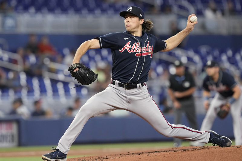 Atlanta Braves starting pitcher Dylan Dodd aims a pitch during the first inning of a baseball game against the Miami Marlins, Thursday, May 4, 2023, in Miami. (AP Photo/Marta Lavandier)