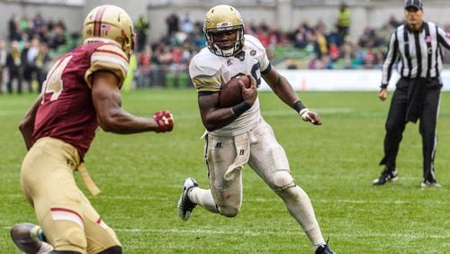 In this photo provided by Georgia Tech, Georgia Tech running back Dedrick Mills (26) rushes toward the end zone against Boston College during the second half of an NCAA college football game, Saturday, Sept. 3, 2016, in Dublin. (Danny Karnik/Georgia Tech via AP)