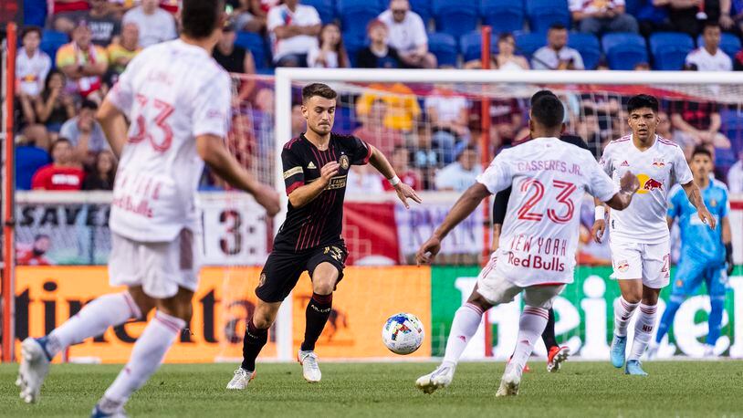 Atlanta United midfielder Amar Sejdic dribbles during the match against the New York Red Bulls at Red Bull Arena in Harrison, United States on Thursday June 30, 2022. (Photo by Dakota Williams/Atlanta United)