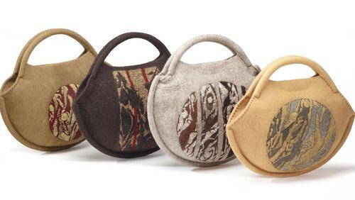 Lisa Klakulak’s sculptural handbags (pictured) and jewelry are wet-felted by hand, using fine wool fiber (not yarn), natural dyes and free-motion embroidery. CONTRIBUTED BY STEVE MANN