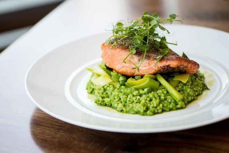  Roasted Steelhead Trout with pea-scented rice grits, and asparagus. Photo credit- Mia Yakel.