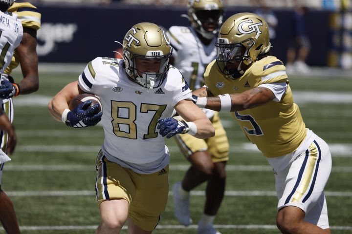 Georgia Tech wide receiver Bailey Stockton (87) extends a catch with Georgia Tech defensive back Clayton Powell-Lee defending during the Spring White and Gold game at Bobby Dodd Stadium at Hyundai Field In Atlanta on Saturday, April 13, 2024.   (Bob Andres for the Atlanta Journal Constitution)