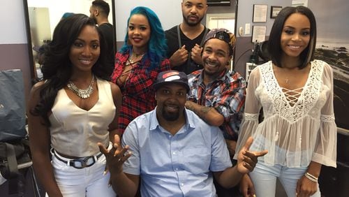 Some of the cast of 'Ink, Paper, Scissors" for BET at Salon Ramsey in Atlanta. CREDIT; Rodney Ho/ rho@ajc.com