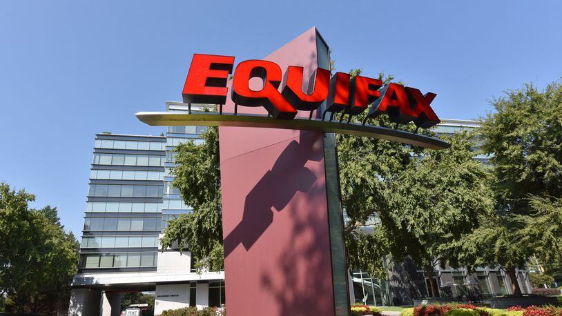 Atlanta-based Equifax is among local companies that plans to start shifting teleworking employees back to corporate offices. HYOSUB SHIN / HSHIN@AJC.COM