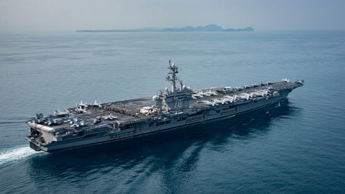 SUNDA STRAIT, INDONESIA - APRIL 14: In this handout provided by the U.S. Navy, the aircraft carrier USS Carl Vinson (CVN 70) transits the Sunda Strait on April 14, 2017 in Indonesia. The Carl Vinson Carrier Strike Group is on a scheduled western Pacific deployment as part of the U.S. Pacific Fleet-led initiative to extend the command and control functions of U.S. 3rd Fleet. U.S Navy aircraft carrier strike groups have patrolled the Indo-Asia-Pacific regularly and routinely for more than 70 years. (Photo by Mass Communication Specialist 2nd Class Sean M. Castellano / U.S. Navy via Getty Images)