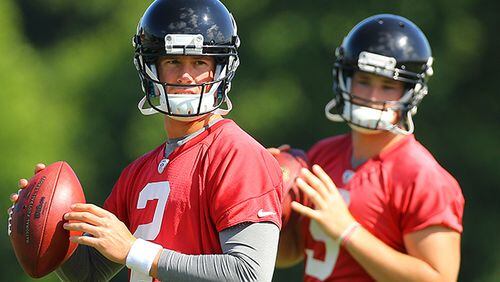 Quarterback Jeff Matthews (background) could throw the ball well, but did not sound like Matt Ryan (foreground) at the line.